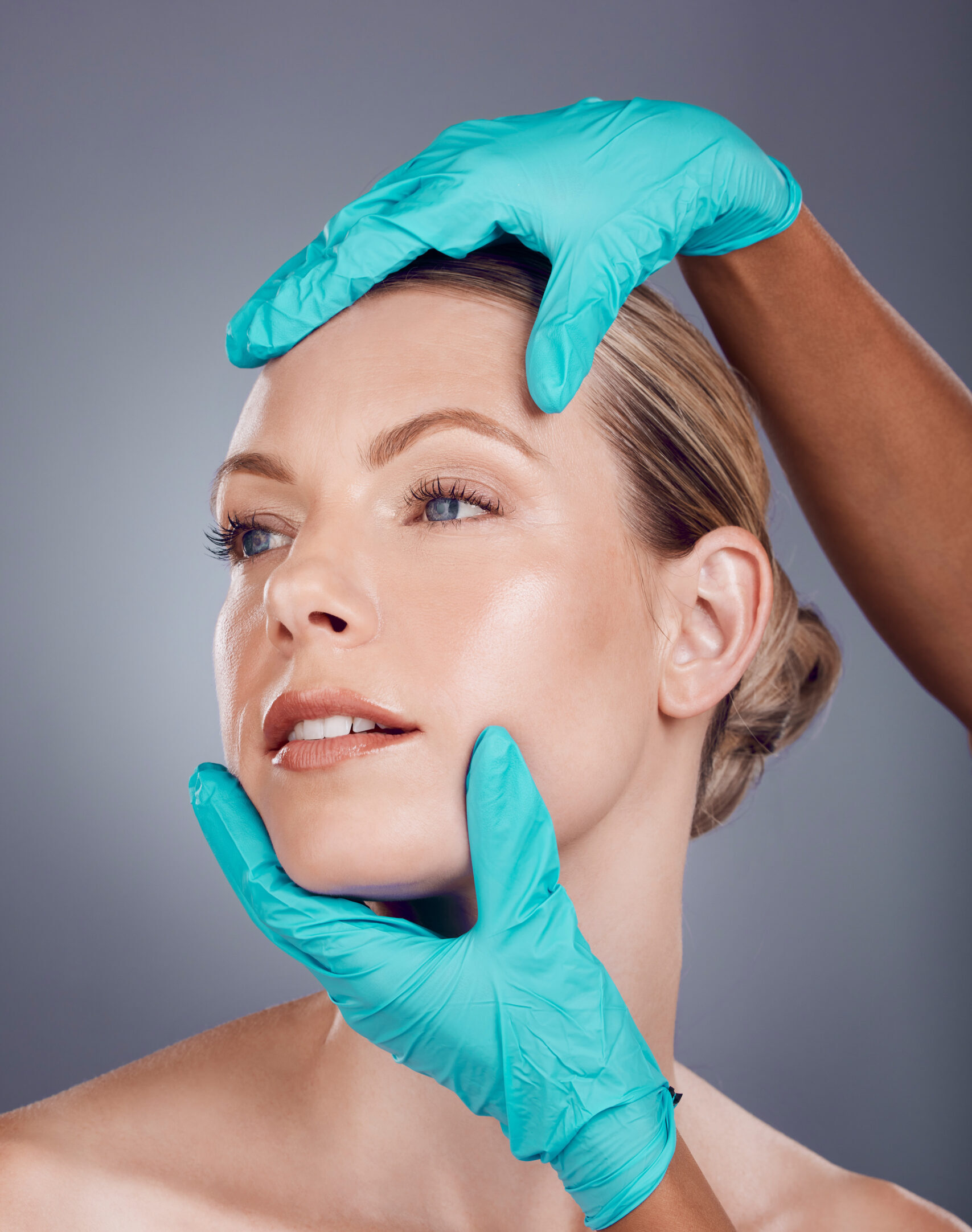 woman studio hands plastic surgery cosmetic transformation beauty by gray background patient anti aging consultation collagen skincare aesthetic face change clinic